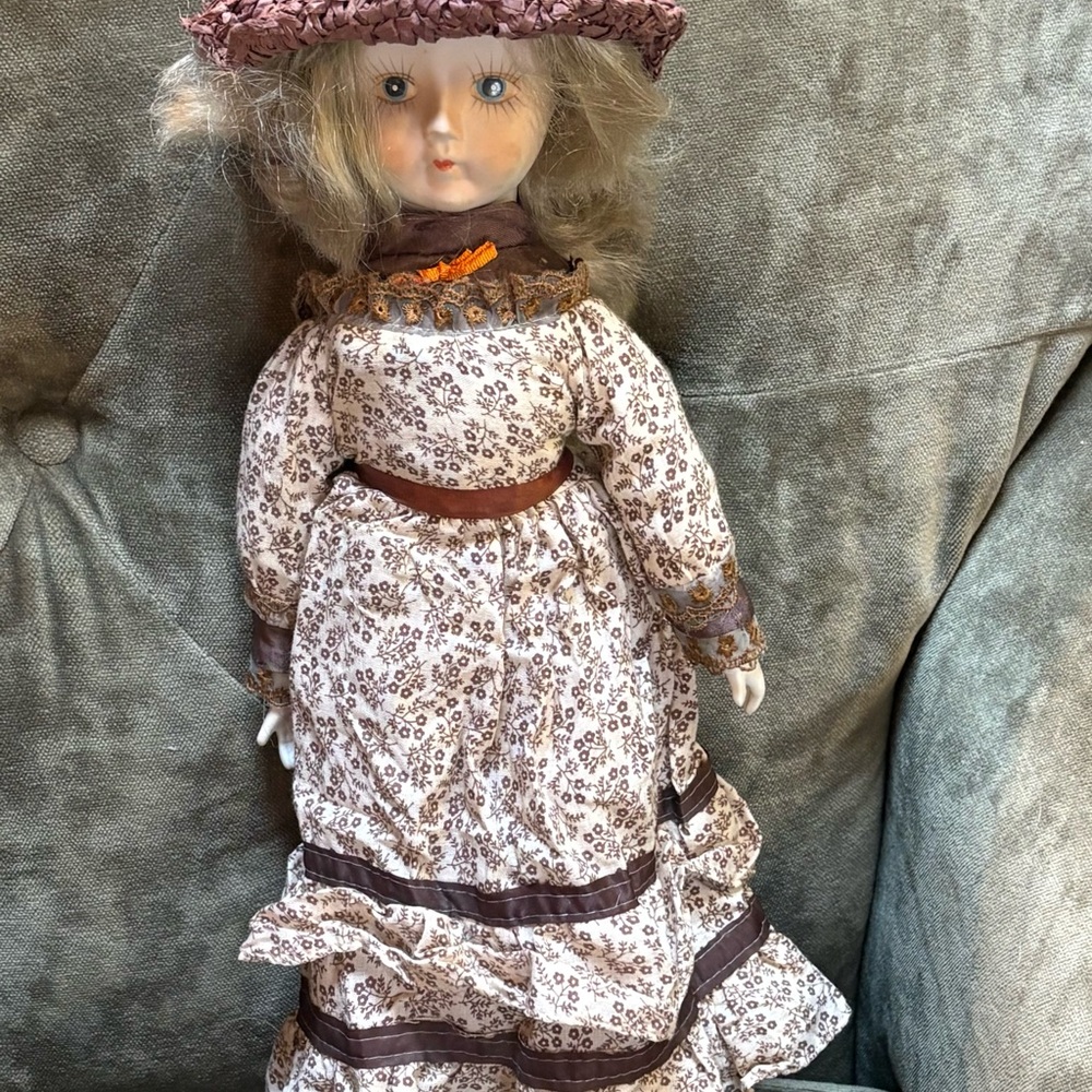 Antique Style Doll with Floral Dress and White Leggings at least 53 years old
